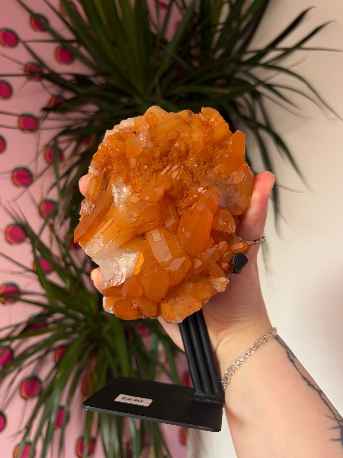 Tangerine Quartz on stand
