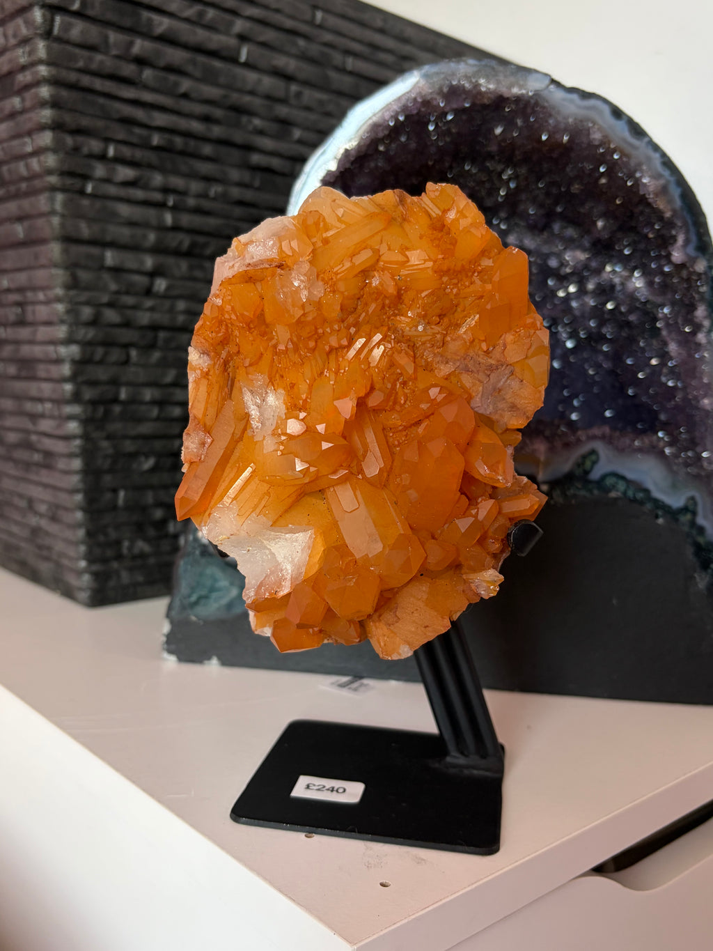 Tangerine Quartz on stand