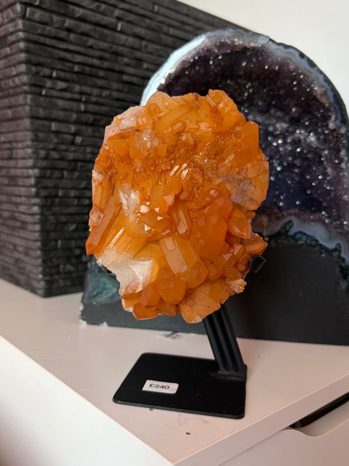 Tangerine Quartz on stand